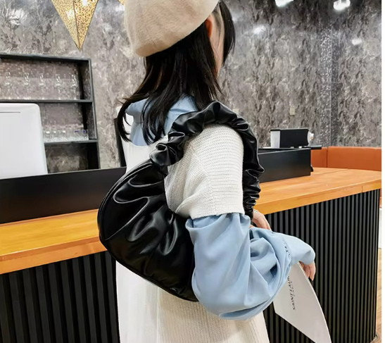 Polly Dumpling Handtas